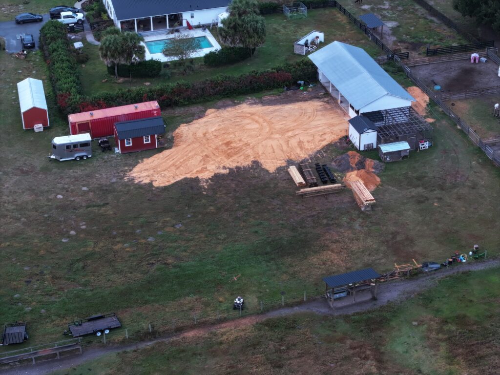 Aerial view of property grading and site preparation for a new pole barn construction project by Southern Pro Pole Barns & Buildings